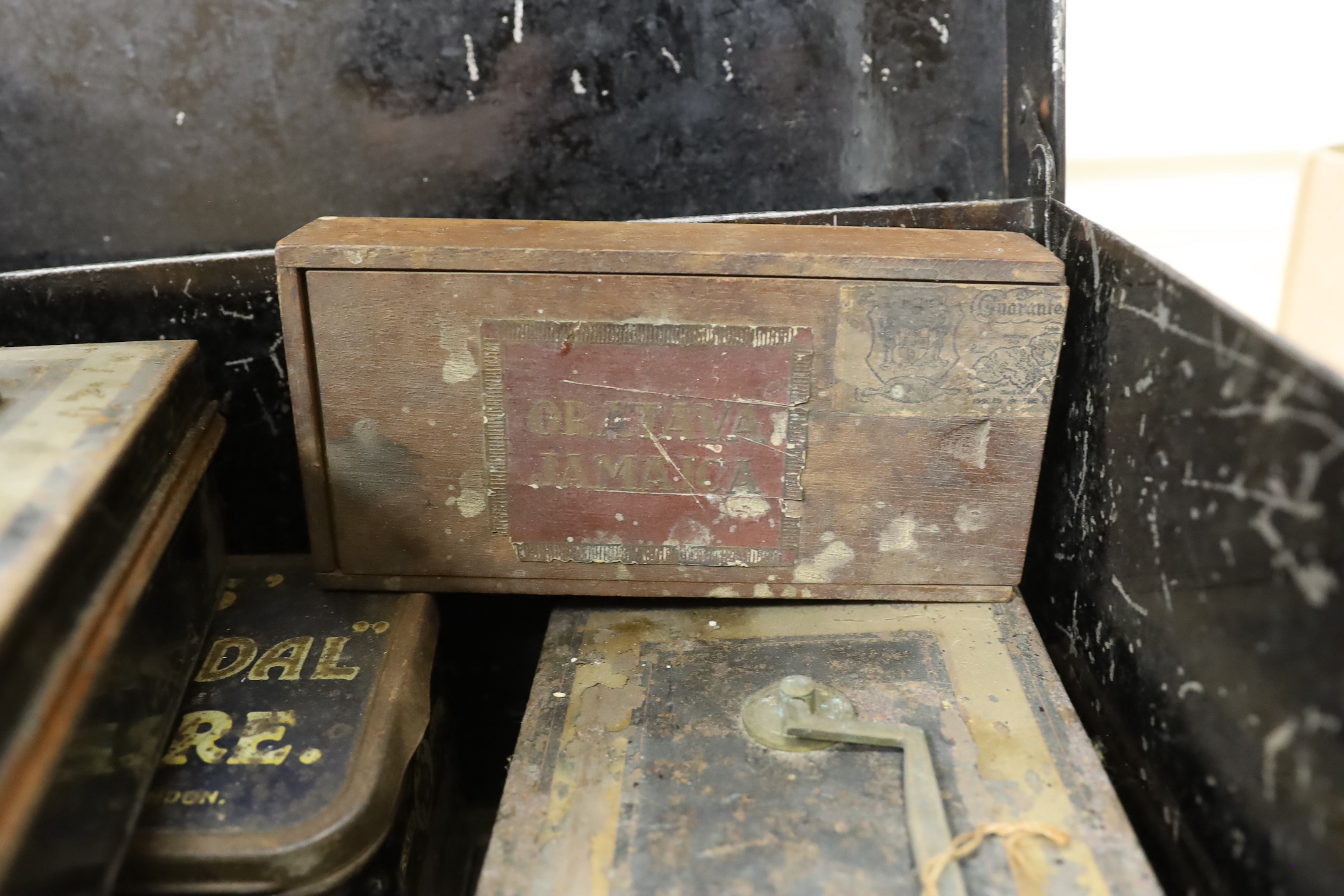 A collection of early to mid century and 20th century tins, a ladies tea disc, a sea cadet corps disc/badge